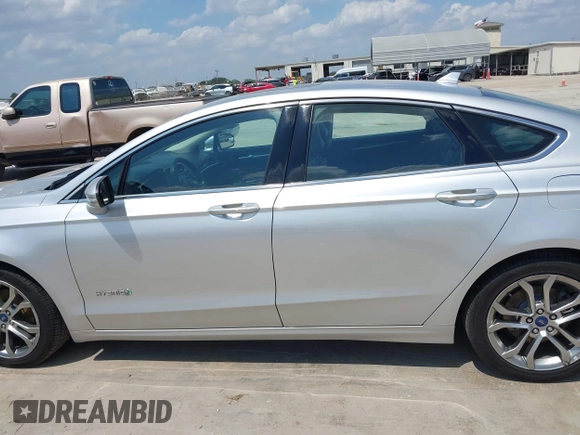 2019 Ford Fusion Titanium with VIN 3FA6P0RUXKR106430, listed as a IAAI auction lot 42329931 with 73,259 mi miles and . Bid and sale history available at DreamBid. Image 14.
