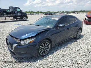 2018 Mazda 3 Touring z VIN 3MZBN1V30JM243211, wystawiony jako Copart lot #58324975 z przebiegiem 86 030 mil mil oraz Szkoda całkowita • Salvage title. Historia ofert i sprzedaży dostępna na DreamBid. Obrazek 1.