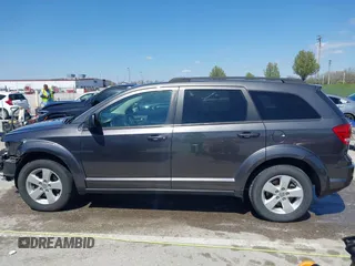 2014 Dodge Journey SE with VIN 3C4PDCAB7ET136799, listed as a IAAI auction lot 41972348 with 163,357 mi miles. Bid and sale history available at carsss.com. Image 15.