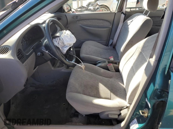 1997 Ford Escort LX with VIN 1FALP13P8VW200707, listed as a Copart auction lot 86647484 with 74,807 mi miles and Salvage Title. Bid and sale history available at carsss.com. Image 7.