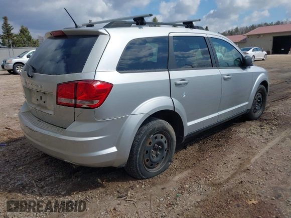 2014 Dodge Journey SE with VIN 3C4PDCAB2ET166065, listed as a IAAI auction lot 42137057 with 194,775 mi miles. Bid and sale history available at carsss.com. Image 4.