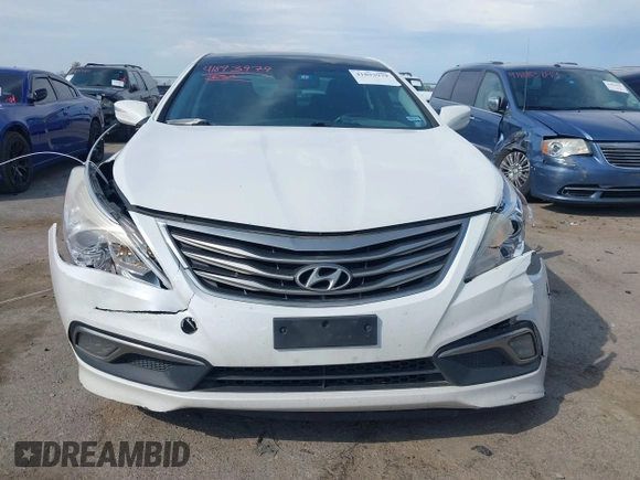 2015 Hyundai Azera Limited with VIN KMHFH4JG7FA476458, listed as a IAAI auction lot 41893979 with 149,114 mi miles and . Bid and sale history available at DreamBid. Image 12.
