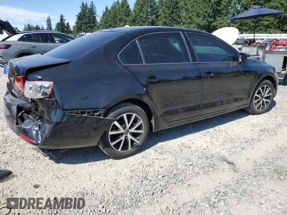 2014 Volkswagen Jetta SE z VIN 3VWD17AJ2EM397825, wystawiony jako Copart lot #64076595 z przebiegiem 61 691 mil mil oraz Szkoda całkowita • Salvage title. Historia ofert i sprzedaży dostępna na DreamBid. Obrazek 3.