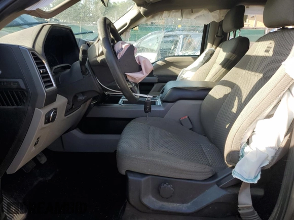 2016 Ford F-150 XLT with VIN 1FTEW1E80GFB46351, listed as a Copart auction lot 60571525 with 225,580 mi miles and Salvage title. Bid and sale history available at DreamBid. Image 7.