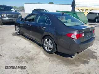 2010 Acura TSX with VIN JH4CU2F63AC003630, listed as a IAAI auction lot 42002216 with 131,244 mi miles. Bid and sale history available at carsss.com. Image 3.