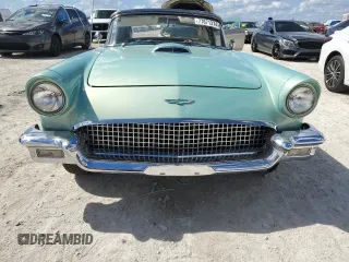 1957 Ford Thunderbird with VIN D7FH182410, listed as a Copart auction lot 77671374 with 319 mi miles and Salvage Title. Bid and sale history available at DreamBid. Image 5.