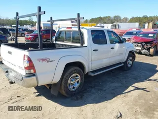 2009 Toyota Tacoma PreRunner with VIN 3TMJU62N79M078810, listed as a IAAI auction lot 41358051 with 154,001 mi miles. Bid and sale history available at carsss.com. Image 4.