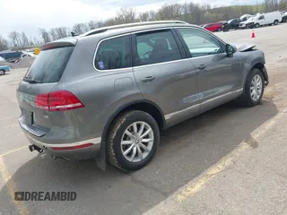 2016 Volkswagen Touareg Sport with VIN WVGEF9BPXGD012206, listed as a IAAI auction lot 42115314 with Not Provided miles and . Bid and sale history available at DreamBid. Image 4.