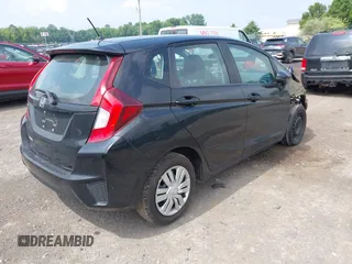 2015 Honda Fit LX with VIN 3HGGK5H56FM724269, listed as a IAAI auction lot 42540407 with 113,702 mi miles and . Bid and sale history available at DreamBid. Image 4.
