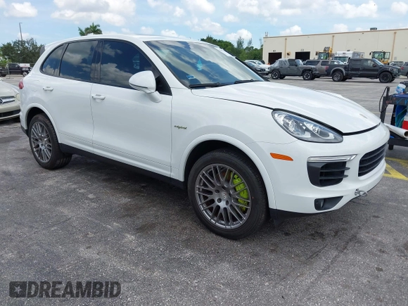 2016 Porsche Cayenne S E-Hybrid with VIN WP1AE2A25GLA63698, listed as a IAAI auction lot 42694555 with 141,957 mi miles and . Bid and sale history available at DreamBid. Image 1.