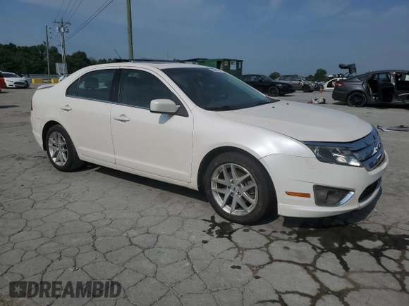 2012 Ford Fusion SEL with VIN 3FAHP0JG7CR428233, listed as a Copart auction lot 60446735 with 271,991 mi miles and Salvage title. Bid and sale history available at DreamBid. Image 4.