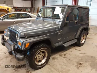 2001 Jeep Wrangler Sport with VIN 1J4FA49SX1P375657, listed as a IAAI auction lot 41943331 with 170,640 mi miles. Bid and sale history available at carsss.com. Image 2.