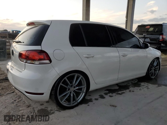 2013 Volkswagen Golf z VIN WVWDA7AJ2DW120061, wystawiony jako Copart lot #77857884 z przebiegiem 165 552 mil mil oraz Szkoda całkowita • Salvage title. Historia ofert i sprzedaży dostępna na DreamBid. Obrazek 3.