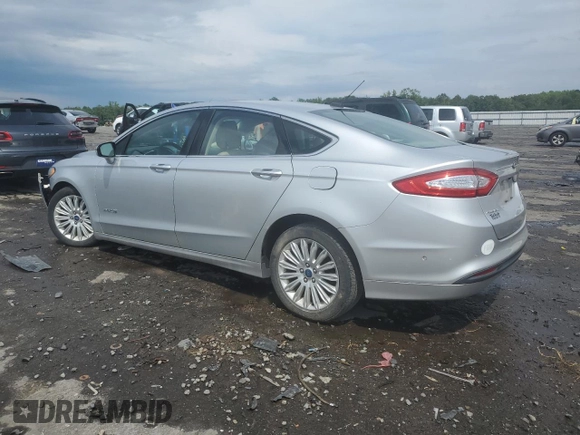 2013 Ford Fusion SE Hybrid с VIN 3FA6P0LU8DR240784, выставлен на аукционе Copart как лот 60202425 с пробегом 159 284 миль миль и Списание • Salvage title. История ставок и продаж доступна на DreamBid. Изображение 2.
