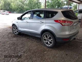 2013 Ford Escape SEL z VIN 1FMCU9HX0DUB99150, wystawiony jako IAAI lot #42812971 z przebiegiem 212 298 mil mil oraz . Historia ofert i sprzedaży dostępna na DreamBid. Obrazek 3.