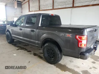 2019 Ford F-150 XL with VIN 1FTEW1CP9KKF28680, listed as a Copart auction lot 59458855 with 149,284 mi miles and Salvage title. Bid and sale history available at DreamBid. Image 2.