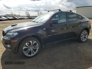 2012 BMW X6 50i z VIN 5UXFG8C59CLZ97450, wystawiony jako Copart lot #55281205 z przebiegiem 188 625 mil mil oraz Czysty tytuł • Clean title. Historia ofert i sprzedaży dostępna na DreamBid. Obrazek 1.