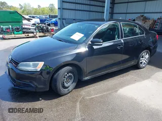 2011 Volkswagen Jetta Sedan SE w/Convenience & Sunroof with VIN 3VWDX7AJ5BM354817, listed as a IAAI auction lot 41919430 with 156,284 mi miles. Bid and sale history available at carsss.com. Image 2.