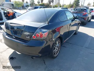 2008 Scion tC Spec with VIN JTKDE167580234717, listed as a IAAI auction lot 41980475 with 164,163 mi miles. Bid and sale history available at carsss.com. Image 4.