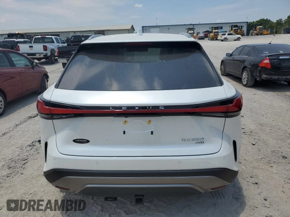 2024 Lexus RX with VIN 2T2BAMCAXRC071481, listed as a Copart auction lot 59457934 with 9,874 mi miles and Salvage Title. Bid and sale history available at carsss.com. Image 6.
