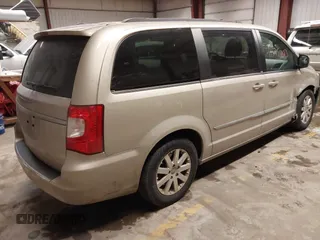 2013 Chrysler Town & Country Touring with VIN 2C4RC1BG5DR731002, listed as a IAAI auction lot 41575003 with 106,486 mi miles. Bid and sale history available at carsss.com. Image 4.