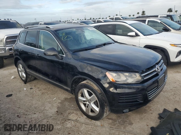 2012 Volkswagen Touareg Exec with VIN WVGEF9BP1CD011407, listed as a Copart auction lot 79199754 with 57,376 mi miles and Salvage Title. Bid and sale history available at DreamBid. Image 4.