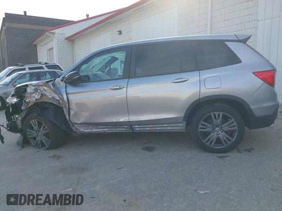 2020 Honda Passport EX-L z VIN 5FNYF8H55LB011307, wystawiony jako IAAI lot #40880877 z przebiegiem 32 509 mil mil oraz . Historia ofert i sprzedaży dostępna na DreamBid. Obrazek 14.