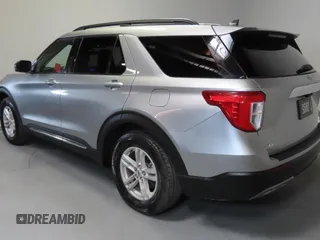 2021 Ford Explorer XLT with VIN 1FMSK7DHXMGB33126, listed as a Copart auction lot 55651595 with 61,895 mi miles and Salvage Title. Bid and sale history available at carsss.com. Image 4.