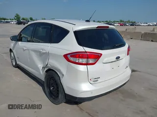 2017 Ford C-Max SE z VIN 1FADP5AU4HL117995, wystawiony jako IAAI lot #42033276 z przebiegiem 105 947 mil mil oraz . Historia ofert i sprzedaży dostępna na DreamBid. Obrazek 3.