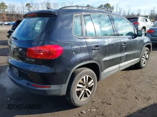 2015 Volkswagen Tiguan SE z VIN WVGAV7AX2FW593453, wystawiony jako IAAI lot #41658359 z przebiegiem 159 619 mil mil oraz . Historia ofert i sprzedaży dostępna na DreamBid. Obrazek 4.