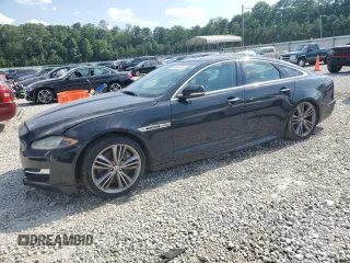 2016 Jaguar XJ with VIN SAJWA1CE1GMW00258, listed as a Copart auction lot 63584365 with 128,057 mi miles and Clean title. Bid and sale history available at DreamBid. Image 1.