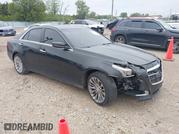 2014 Cadillac CTS Luxury AWD with VIN 1G6AX5SX9E0197395, listed as a IAAI auction lot 42211452 with 90,657 mi miles and . Bid and sale history available at DreamBid. Image 1.