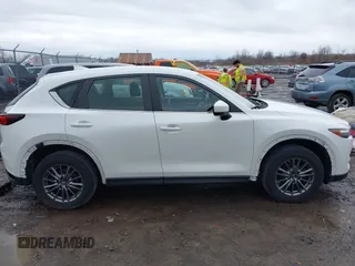2019 Mazda CX-5 Sport with VIN JM3KFBBM2K0629966, listed as a IAAI auction lot 41953702 with 48,496 mi miles and . Bid and sale history available at DreamBid. Image 14.