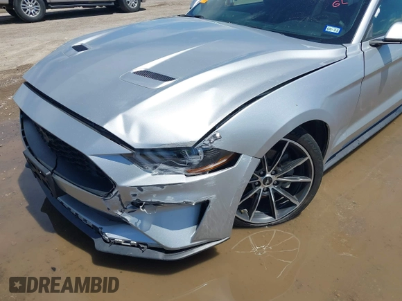 2018 Ford Mustang EcoBoost with VIN 1FA6P8THXJ5128830, listed as a IAAI auction lot 42192673 with 58,817 mi miles and . Bid and sale history available at DreamBid. Image 12.