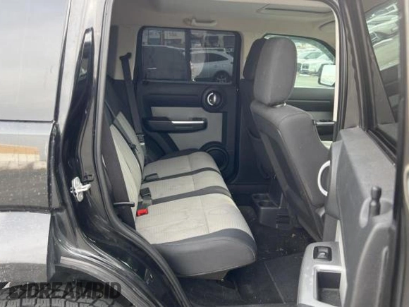 2008 Dodge Nitro SLT z VIN 1D8GU58K68W145253, wystawiony jako Copart lot #43768705 z przebiegiem 167 904 mil mil oraz Czysty tytuł • Clean title. Historia ofert i sprzedaży dostępna na DreamBid. Obrazek 6.