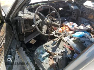 1986 Pontiac Bonneville Brougham z VIN 2G2GR69H9G2241181, wystawiony jako Copart lot #68122684 z przebiegiem Nie podano mil oraz Nie do naprawy • Non repairable. Historia ofert i sprzedaży dostępna na DreamBid. Obrazek 8.