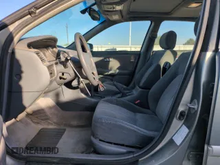 2001 Toyota Camry LE z VIN JT2BF22K810291438, wystawiony jako Copart lot #54261565 z przebiegiem 174 101 mil mil oraz Szkoda całkowita • Salvage title. Historia ofert i sprzedaży dostępna na DreamBid. Obrazek 7.