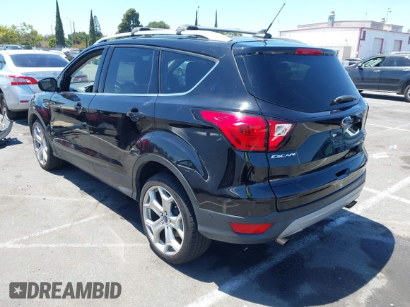 2019 Ford Escape Titanium with VIN 1FMCU9J98KUA21480, listed as a IAAI auction lot 42698275 with 65,478 mi miles and . Bid and sale history available at DreamBid. Image 3.