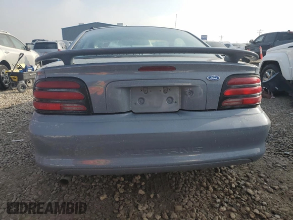 1994 Ford Mustang with VIN 1FALP4046RF182709, listed as a Copart auction lot 83690394 with 236,274 mi miles and Salvage Title. Bid and sale history available at carsss.com. Image 6.
