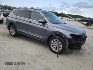 2018 Volkswagen Tiguan SEL with VIN 3VV3B7AX5JM125247, listed as a Copart auction lot 61404605 with 96,748 mi miles and Salvage title. Bid and sale history available at DreamBid. Image 4.