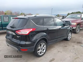 2015 Ford Escape Titanium with VIN 1FMCU9J96FUA27221, listed as a IAAI auction lot 41925276 with 180,758 mi miles and . Bid and sale history available at carsss.com. Image 4.