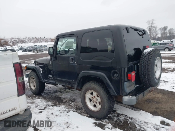 2005 Jeep Wrangler X with VIN 1J4FA39S55P353131, listed as a IAAI auction lot 41575949 with 154,026 mi miles and . Bid and sale history available at DreamBid. Image 14.