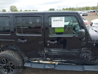 2018 Jeep Wrangler JK Unlimited Altitude with VIN 1C4BJWEG7JL881133, listed as a IAAI auction lot 40404302 with 95,726 mi miles. Bid and sale history available at carsss.com. Image 13.