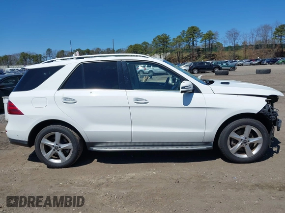 2018 Mercedes-Benz GLE 350 with VIN 4JGDA5HB1JB042700, listed as a IAAI auction lot 42052645 with 77,740 mi miles and . Bid and sale history available at DreamBid. Image 13.