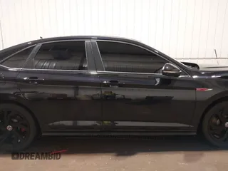2023 Volkswagen Jetta Autobahn with VIN 3VW1T7BU1PM002445, listed as a IAAI auction lot 41882855 with 25,641 mi miles and . Bid and sale history available at DreamBid. Image 13.