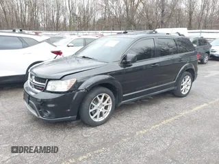 2013 Dodge Journey Crew с VIN 3C4PDCCG1DT640935, выставлен на аукционе IAAI как лот 40676564 с пробегом 154 885 миль миль и . История ставок и продаж доступна на DreamBid. Изображение 2.