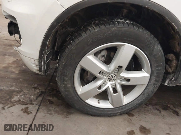 2013 Volkswagen Touareg Lux with VIN WVGEF9BP5DD011511, listed as a IAAI auction lot 41608840 with 167,350 mi miles and . Bid and sale history available at DreamBid. Image 12.