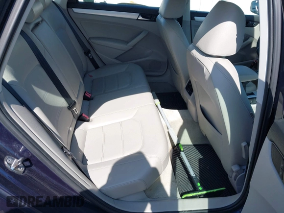 2013 Volkswagen Passat SE w/Sunroof & Nav with VIN 1VWBP7A30DC074235, listed as a IAAI auction lot 41967875 with 153,803 mi miles. Bid and sale history available at carsss.com. Image 8.