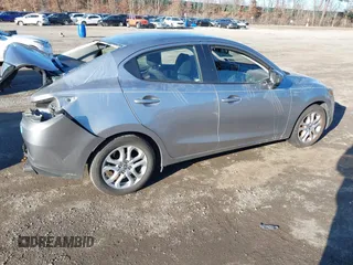 2016 Scion iA with VIN 3MYDLBZV5GY129856, listed as a IAAI auction lot 41624817 with 69,686 mi miles. Bid and sale history available at carsss.com. Image 4.
