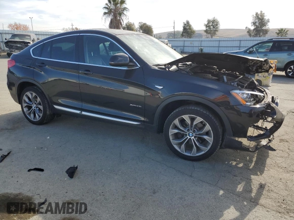 2016 BMW X4 xDrive28i with VIN 5UXXW3C50G0R22606, listed as a Copart auction lot 67657412 with 65,119 mi miles. Bid and sale history available at carsss.com. Image 4.
